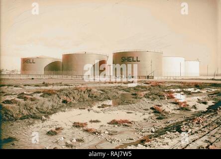 Shell oil tanks near Haifa close up. 1934, Israel, Haifa. Reimagined by Gibon. Classic art with a modern twist reimagined Stock Photo