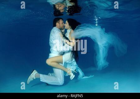 Underwater wedding in pool, Odessa, Ukraine, Eastern Europe Stock Photo