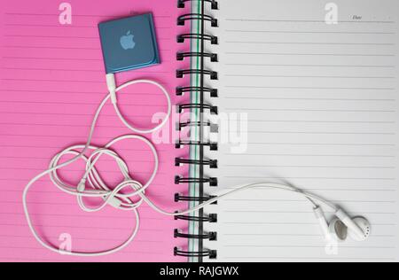 IPod nano mp3 music player on a notebook Stock Photo