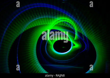 Abstract lights in circles and ovals of different sizes and colors. Light painting photo. Stock Photo