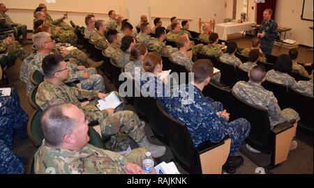 Capt. David K. Weiss, commander of Naval Hospital Bremerton, welcomes dental officers from the Army, Navy and Air Force at the first Puget Sound Military Health System Dental Leadership Symposium Feb 2 at Naval Hospital Bremerton. Stock Photo