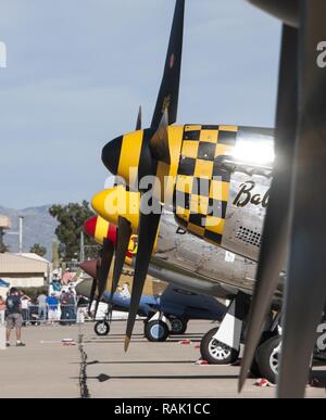 Historical aircraft rest on the flight line during the 2017 Heritage Flight Training and Certification Course at Davis-Monthan Air Force Base, Ariz., Feb. 11, 2017. The annual aerial demonstration training event has been held at D-M since 2001. The modern aircraft that participated in this year's HFTCC were the F-35 Lightning II, the F-22 Raptor, F-16 Fighting Falcon and the A-10C Thunderbolt II. The historic aircraft included the P-51 and T-51 Mustang, P-40 Warhawk, P-38 Lightning, P-47 Thunderbolt, T-33 Shooting Star and F-86 Sabre. Stock Photo