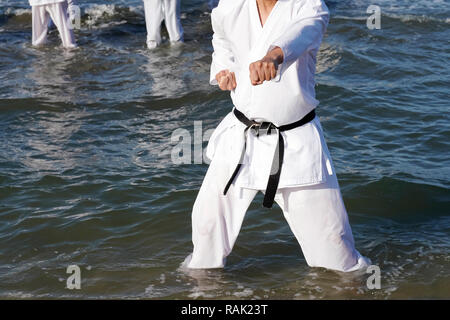 Japanese karate martial arts training at the beach Stock Photo