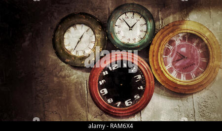 Abstract Retro Clocks on the Stone Wall Background Stock Photo