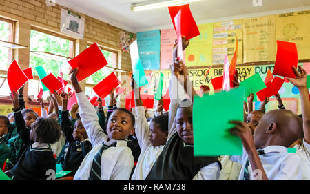 Soweto, South Africa - October 26 2011: African Children in Primary School Classroom Stock Photo