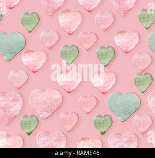 Watercolor pink green hearts on pink background. Hand made seamless pattern Stock Photo