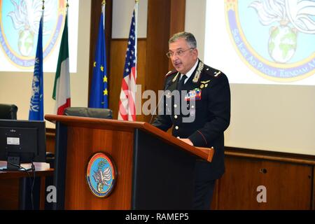 Commanding General, Brig. Gen. Giovanni Pietro Barbano (right), Center of Excellence for Stability Police Units (CoESPU) director, addresses dignitaries and guests from Europe, Africa, Italy and the U.S. during the graduation ceremony of the 14th Protection of Civilians Course at the CoESPU in Vicenza, Italy, February 21, 2017.