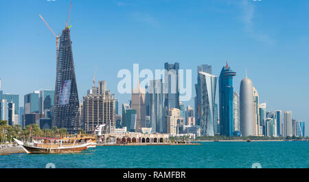 Daytime Skyline view of West Bay business district from The Corniche in Doha, Qatar Stock Photo