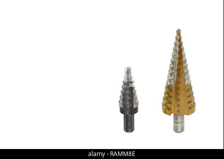 Step drills with spiral flutes on white background. Clipping inside. Stock Photo