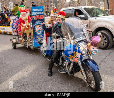 New York, USA. 4th Jan 2019. A performer rides his bike carrying Santa in the 42nd Annual Three Kings Day Parade El Barrio (East Harlem, New York city), Organized by El Museo del Barrio, the event celebrates the popular belief that three wise men visited Jesus. Credit: Enrique Shore/Alamy Live News Stock Photo