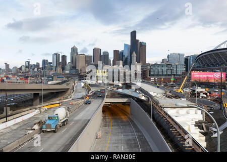 Seattle, Washington, USA. 4th January, 2019. Washington State Department of Transportation prepares to close the first two ramps of the Alaskan Way Viaduct near the south end of the tunnel on January 4 in advance of the highway’s permanent closure. A two-mile long, bored road tunnel is replacing the Alaskan Way Viaduct, carrying State Route 99 under downtown Seattle from the SODO neighborhood to South Lake Union. The viaduct is scheduled to close permanently on January 11 so crews can move State Route 99 from the viaduct to the state-of-the-art tunnel. Credit: Paul Christian Gordon/Alamy Live  Stock Photo