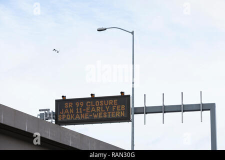 Seattle, Washington, USA. 4th January, 2019. A variable-message sign warns drivers in advance of the Alaskan Way Viaduct’s permanent closure as they enter downtown. A two-mile long, bored road tunnel is replacing the Alaskan Way Viaduct, carrying State Route 99 under downtown Seattle from the SODO neighborhood to South Lake Union. The viaduct is scheduled to close permanently on January 11 so crews can move State Route 99 from the viaduct to the state-of-the-art tunnel. Credit: Paul Christian Gordon/Alamy Live News Stock Photo