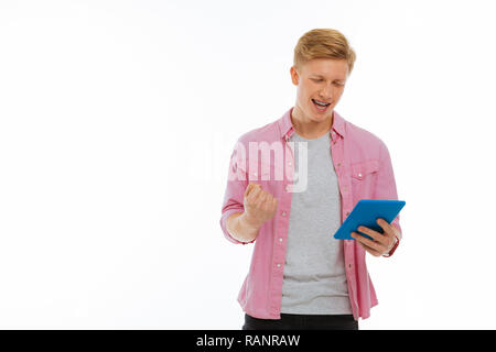 Joyful nice young man feeling very happy Stock Photo