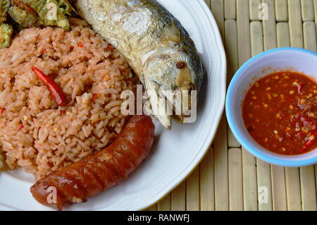 spicy fried rice with shrimp paste sauce and mackerel on dish Stock Photo