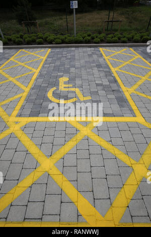Scotland, Ayrshire, Largs, Yellow Hatched disabled parking bay Stock Photo