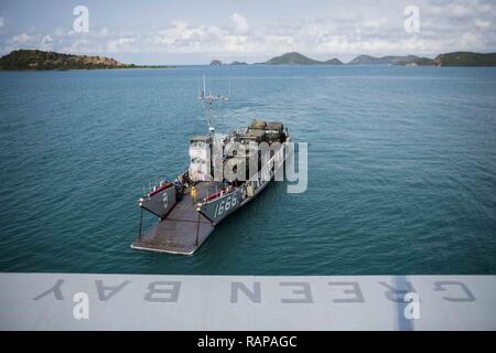 SATTAHIP, Thailand (Feb. 24, 2017) Landing craft utility 1666, assigned to Naval Beach Unit 7, prepares to embark the well deck of the amphibious transport dock ship USS Green Bay (LPD 20) during Exercise Cobra Gold 2017. Cobra Gold is the largest Theater Security Cooperation exercise in the Indo-Asia-Pacific region and is an integral part of the U.S. commitment to strengthen engagement in the region. Stock Photo