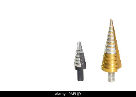 Step drills with spiral flutes on white background. Clipping inside. Stock Photo