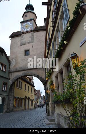 The narrow and picturesque streets of Rothenburg ob der tauber, The Fairi - tale dream town. Visiting Germany. Stock Photo