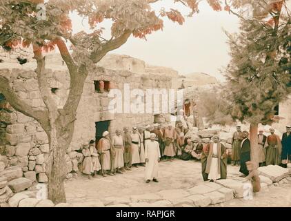 Halhul village at kilometer 30 on Hebron road Courtyard in front of guest chamber, Halhul. 1940, West Bank, Ḥalḥūl reimagined Stock Photo