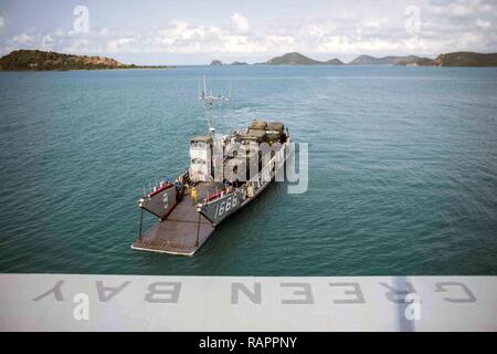 SATTAHIP, Thailand (Feb. 24, 2017) Landing craft utility 1666, assigned to Naval Beach Unit 7, embarks the well deck of the amphibious transport dock ship USS Green Bay (LPD 20) during Exercise Cobra Gold 2017. The exercise is the largest theater security cooperation exercise in the Indo-Asia-Pacific region and is an integral part of the U.S. commitment to strengthen engagement in the region. Stock Photo