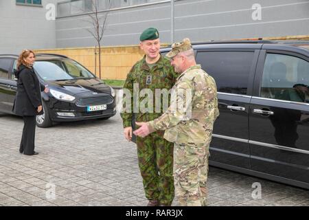 Lt. Gen. Christopher Cavoli, U.S. Army Europe commander, welcomes Maj. Gen.   Valdemaras Rupšys, Lithuanian Land Force commander, to U.S. Army Europe   headquarters with an honor cordon.    Rupšys and Sgt. Maj. Remigijus Katinas, Lithuanian Land Force sergeant major,   traveled to Wiesbaden, Germany, to speak with Cavoli about cooperation   opportunities between the U.S. and Lithuania. The visit also recognized the   ongoing partnership and past accomplishments between the two armies.    The 529th Military Police Company provided the honor cordon and the color   guard was made up of Soldiers f Stock Photo