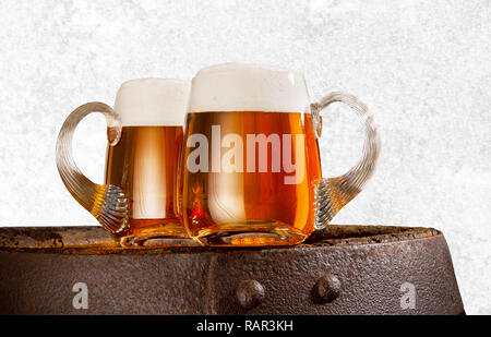 Two glasses of beer on the white background Stock Photo