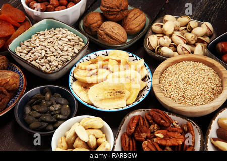 Composition with dried fruits and assorted healthy nuts. Stock Photo