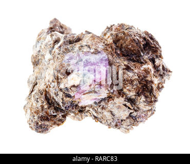 macro photography of natural mineral from geological collection - Corundum crystal in rough Phlogopite (magnesium Mica) stone on white background Stock Photo