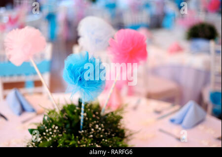 MERIDA, YUC/MEXICO - NOV 18, 2017: Twin babies's baptismal party venue decoration and gifts for guests. Centerpiece Stock Photo