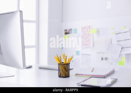 Graphite pencils in a metal grid-container. Concept. Stock Photo