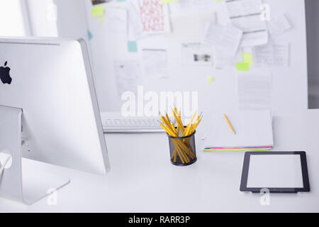 Graphite pencils in a metal grid-container. Concept. Stock Photo