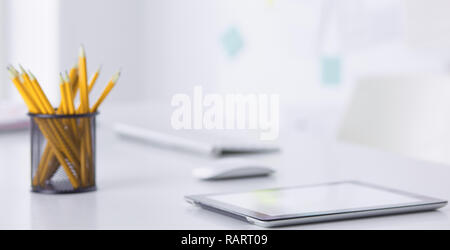 Graphite pencils in a metal grid-container. Concept. Stock Photo