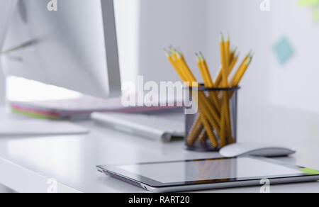 Graphite pencils in a metal grid-container. Concept. Stock Photo
