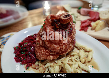 Roasted Schweinshaxe (German pork leg, pork knuckle) - image Stock Photo