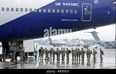 U.S. Airmen from the 62nd Aerial Port Squadron of Joint Base Lewis ...