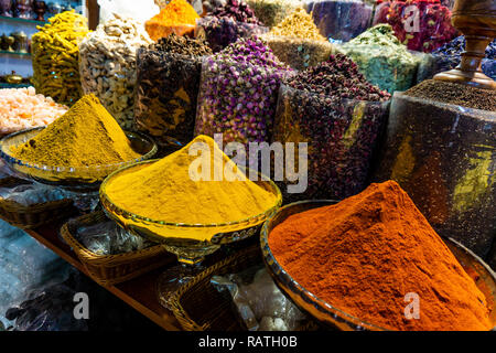 Colorful different spices in the spice market souk in old Dubai rustic Stock Photo
