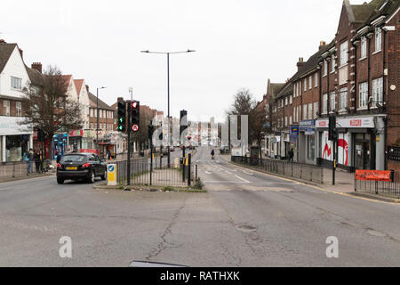 Looking north at the junction of Nash Way and Kenton Road, London, England on a cloudy day in January. Stock Photo