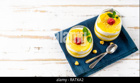 Mango smoothie with yogurt in two glasses Stock Photo