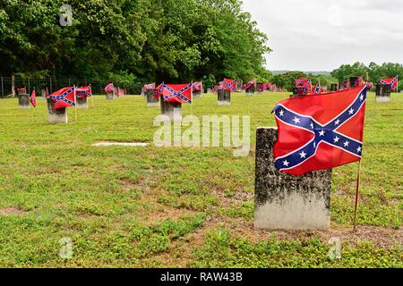 American Civil War Confederate army cemetery with small confederate flags by the headstones in Marbury Alabama, USA. Stock Photo