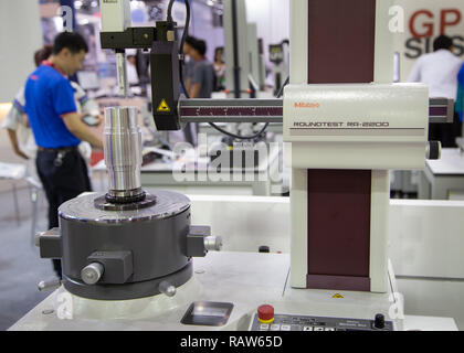 Bangkok, Thailand - November 23, 2018: Roughness / Cylindricity Measuring Instrument perform round test in Metalex 2018 Stock Photo