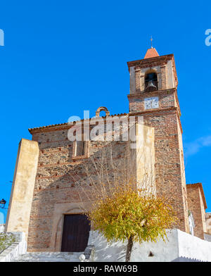 The church of Santiago El Mayor, of Castano del Robledo is located within a privileged natural environment of the Sierra Huelva and a well-preserved u Stock Photo