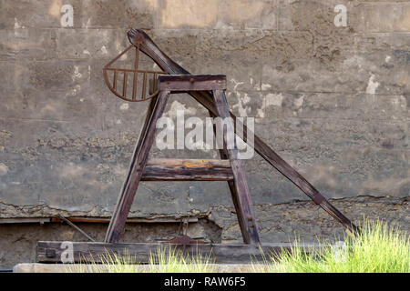 Wooden Medieval Catapult. Ballistic Device. Ancient Military Technology Stock Photo