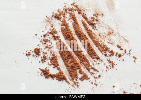Several beige face powder, eye shadow on white background, makeup cosmetics. Stock Photo