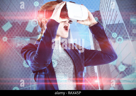Composite image of surprised young businesswoman wearing vr glasses Stock Photo