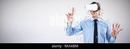 Composite image of happy young businessman gesturing while wearing futuristic glasses Stock Photo