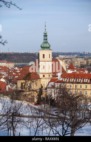 Church of Our Lady Victorious in Karmelitská street, Prague, Czech Republic in the winter with snow on the ground following snowfall Stock Photo