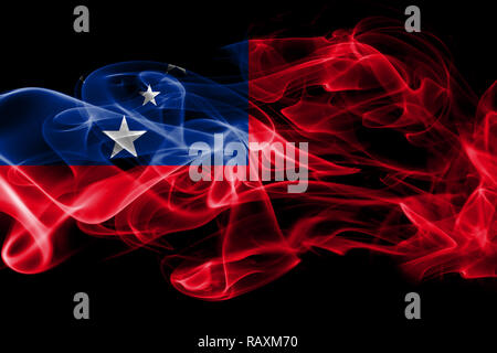 National flag of Samoa made from colored smoke isolated on black background Stock Photo