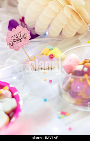 Birthday cookies - detail of a dessert table - colorful cookies with pink birthday topper Stock Photo