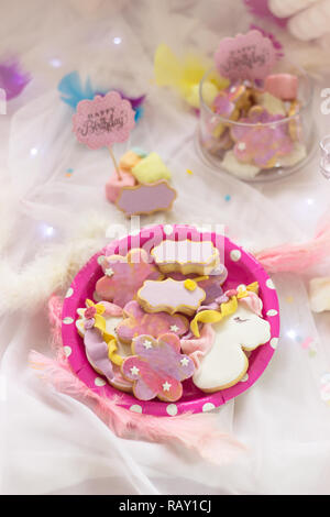 Birthday cookies - detail of a dessert table - colorful cookies with pink 'Happy Birthday' topper Stock Photo