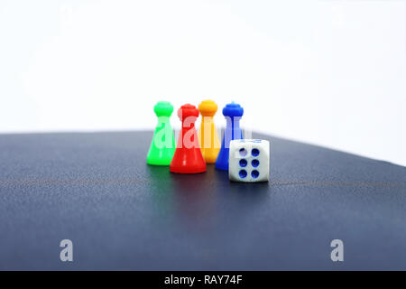 Picture of ludo tokens and dice. Stock Photo